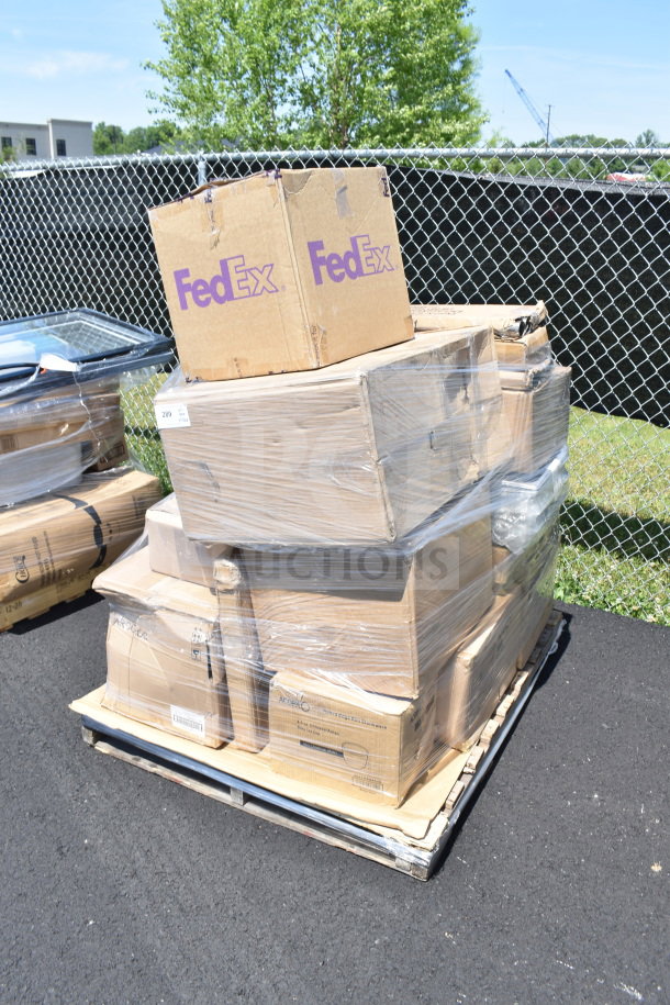 Pallet with FedEx boxes containing 31 brand new scratch and dent items like tea cups, glasses, and milk crates. Wrapped and labeled.
