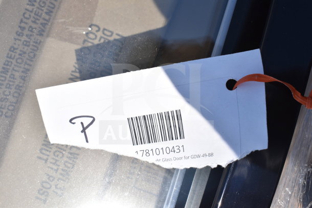 Barcode tag labeled "1781010431" on glass door for GDW-49-BB, part of a scratch and dent auction lot.