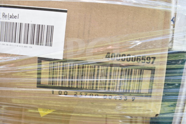 Cardboard box with barcode and label, wrapped in plastic. Contains 17 brand new scratch and dent items like glass door.