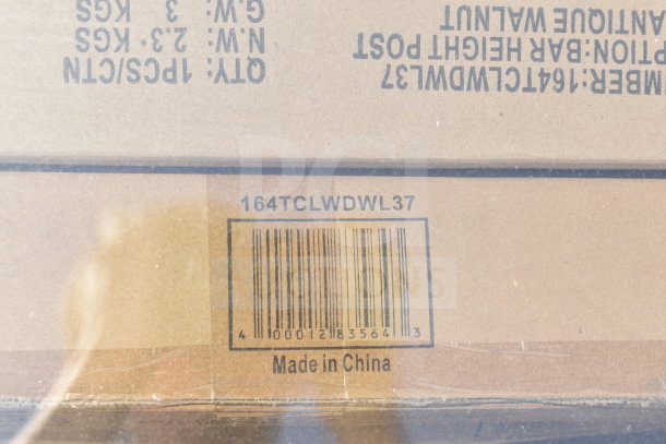 Barcoded box labeled "164TCLWDWL37," marked "Made in China," indicating a scratch and dent auction item.