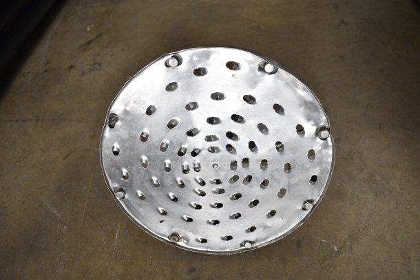 Metal vent cover with circular perforations, used, in good condition.