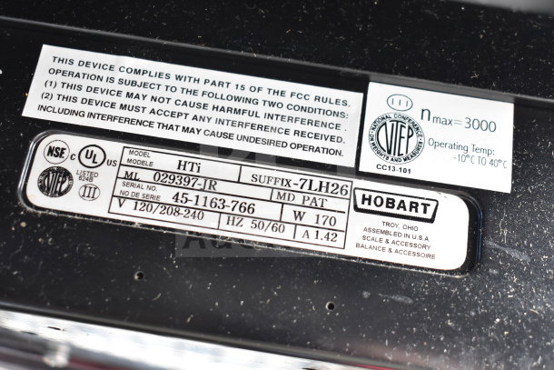 2017 Hobart HTi-7LH26 commercial scale label; 120/208-240V, model details visible. Back screen works, front screen non-functional.