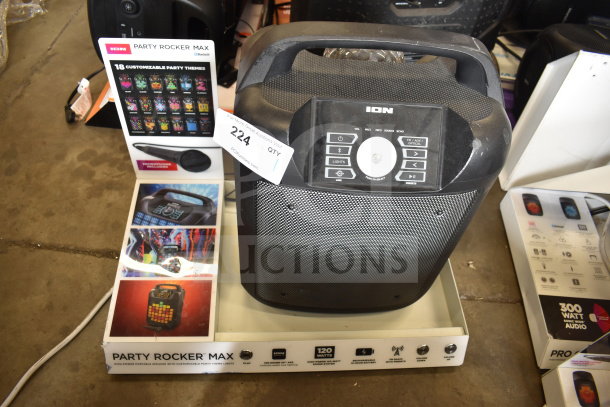 Ion Party Rocker Max speaker on store display with customizable party themes, microphone included, 120 watts power, Bluetooth.