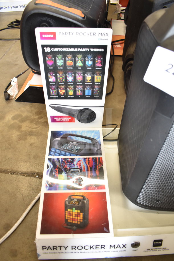 Store display featuring Ion Party Rocker Max Speaker with customizable party themes and included microphone.