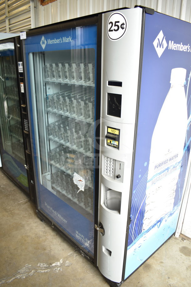 Crane 5800-4 commercial vending machine with bill acceptor, 115 volts, 1 phase. Features two glass display panels.