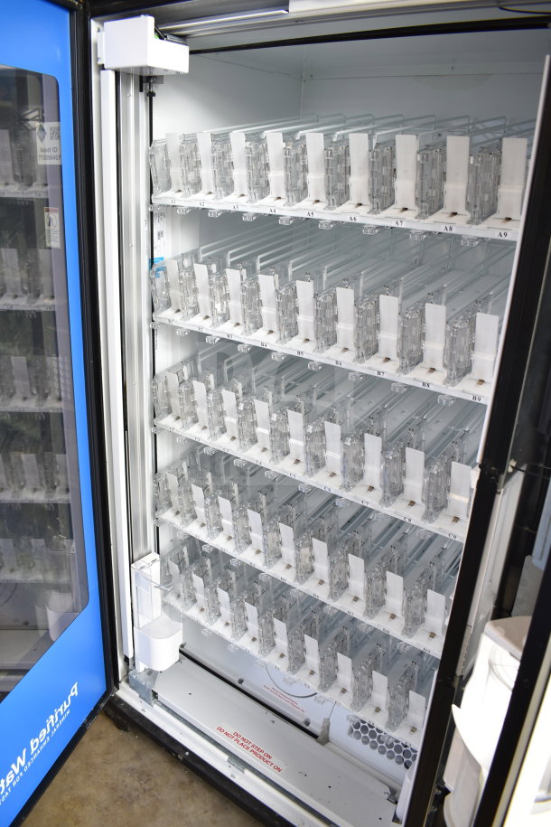 Crane 5800-4 commercial bottled drink vending machine with bill acceptor, 115V, 1 phase, empty shelves visible.