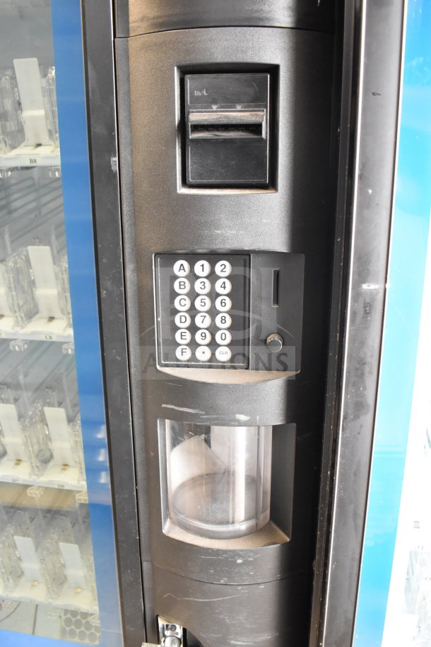 Crane 5800-4 commercial vending machine, features bill acceptor, keypad, 115V, 1 phase, used condition.