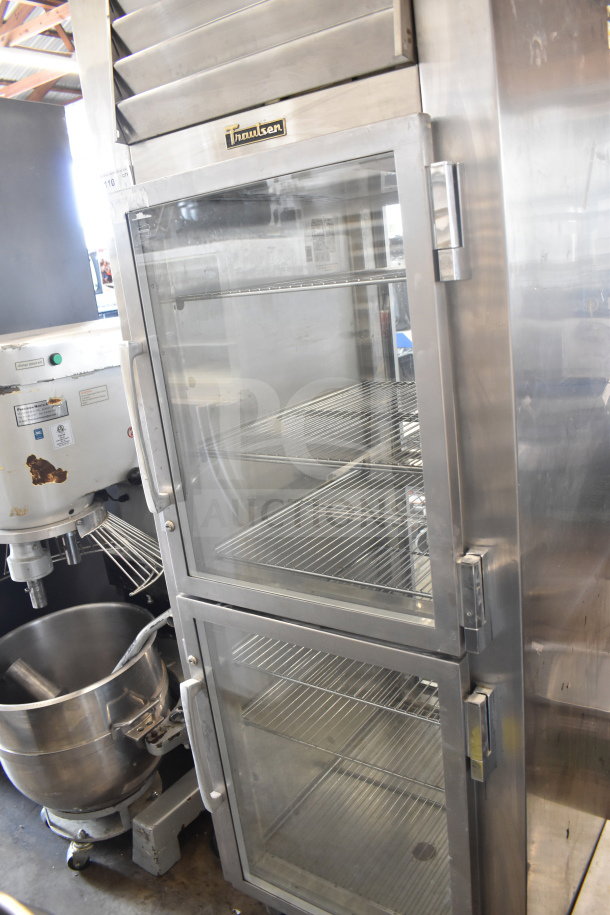 Traulsen RHT132WPTHHG commercial reach-in cooler, 2 half-size glass doors, missing doors, 115 volts, 1 phase, stainless steel.