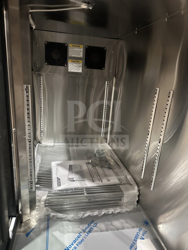 Brand new Beverage-Air stainless steel triple sliding glass door back bar cooler, model BB72HC-1-F-GS-S-27-ALT, tags visible.