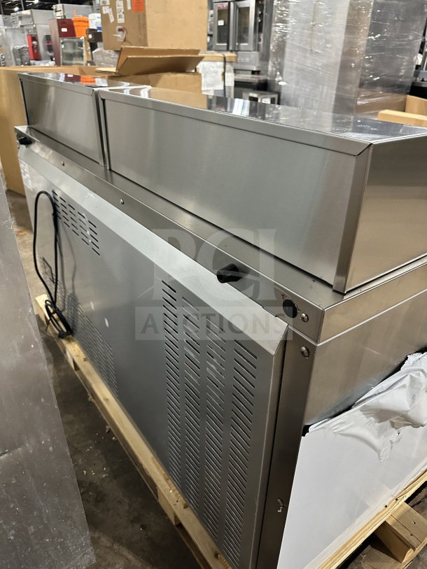 Brand new Continental SW602N24M/D00 60" stainless steel sandwich prep table with 4 drawers, casters, 115V, SN: 162A5375.