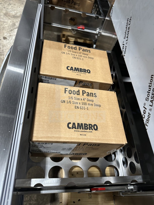 Brand new Continental 60" stainless steel sandwich prep table with 4 drawers, model SW602N24MD00, on casters, includes Cambro food pans.