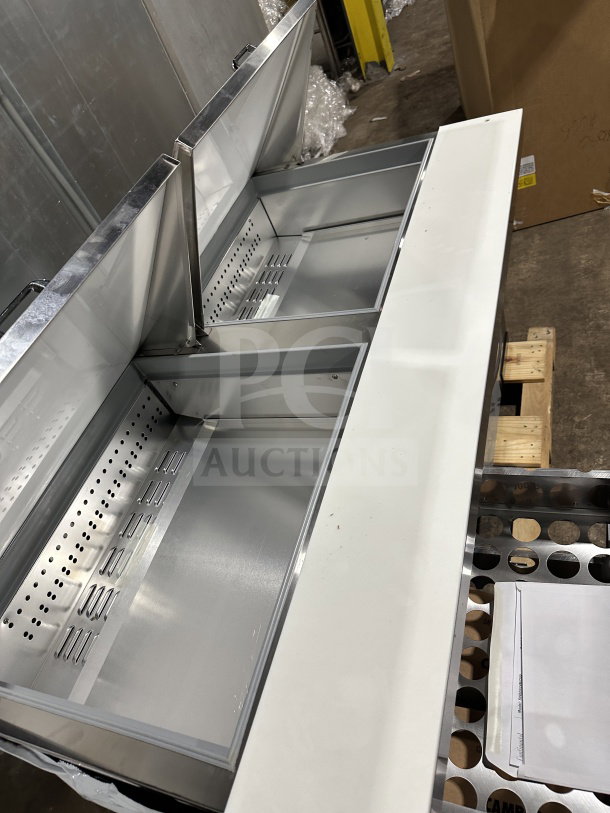 Brand new Continental 60" Mighty Top sandwich prep table, model SW602N24MD00, stainless steel with 4 drawers, on casters.