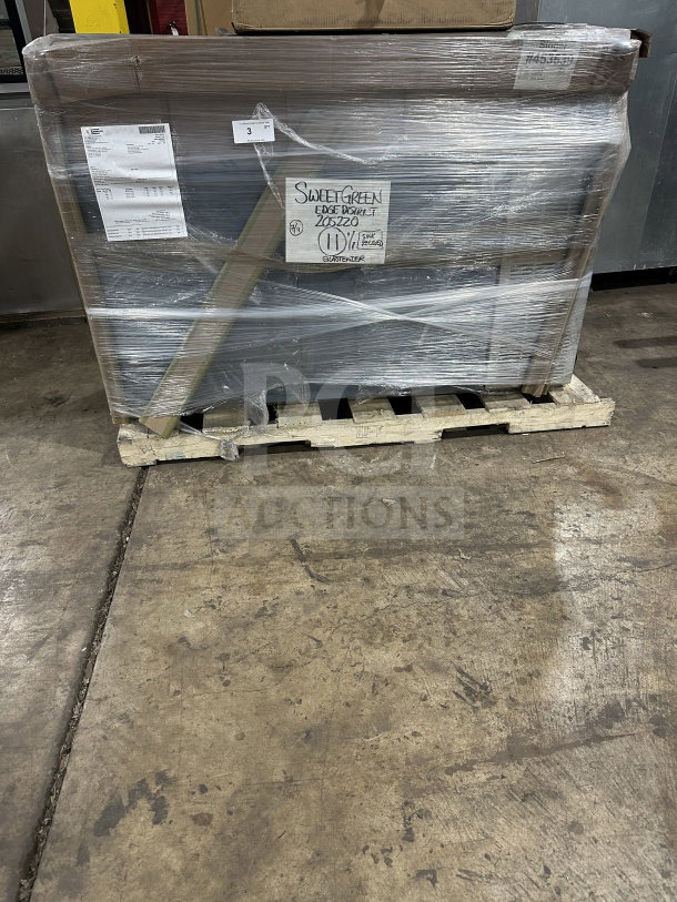 Brand new Glastender C1FL60 commercial stainless steel 2-door refrigerated back bar cabinet, wrapped on pallet. Model and SN visible.