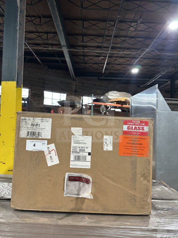Cadco OV-013 convection oven in original packaging, new condition, model OV013, includes safety and handling labels.