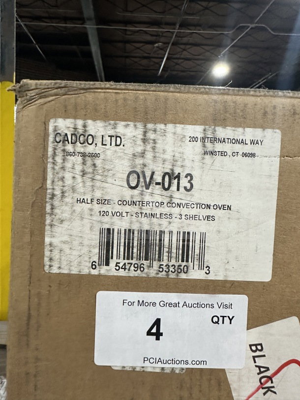 Cadco Model OV-013 commercial convection oven in box, serial 2023G0073555, 120V, stainless steel, 3 shelves, brand new.