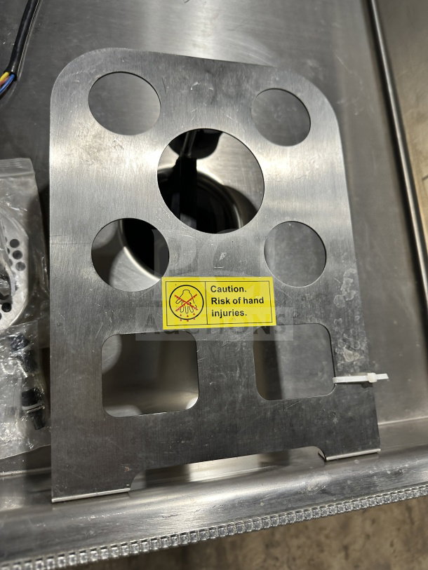 Vevor DJ42 stainless steel meat grinder, new condition. Features caution label warning of hand injuries. Model and serial number visible.