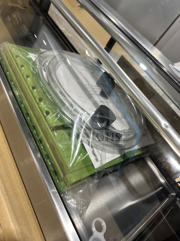 Alt text: Hoshizaki 83" curved glass refrigerated display case, model HNC210BALSLH, new condition with left side compressor.