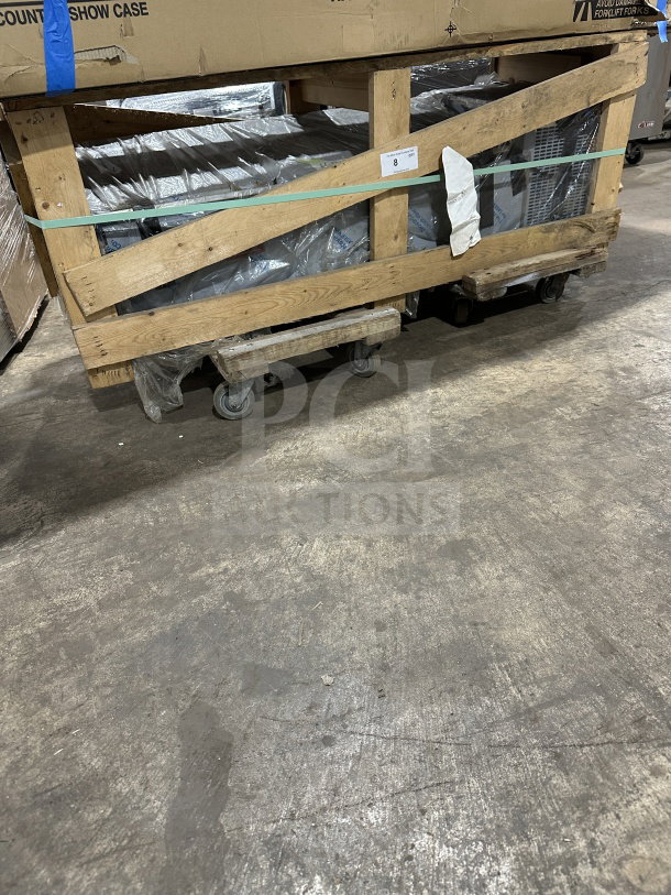 Brand new Randell CR9060290 stainless steel refrigerated countertop condiment rail in packaging, with tags.