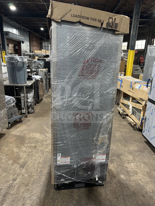 Brand new True stainless steel reach-in refrigerator/freezer, model 23DTGHCFGD01, wrapped, with caution labels.