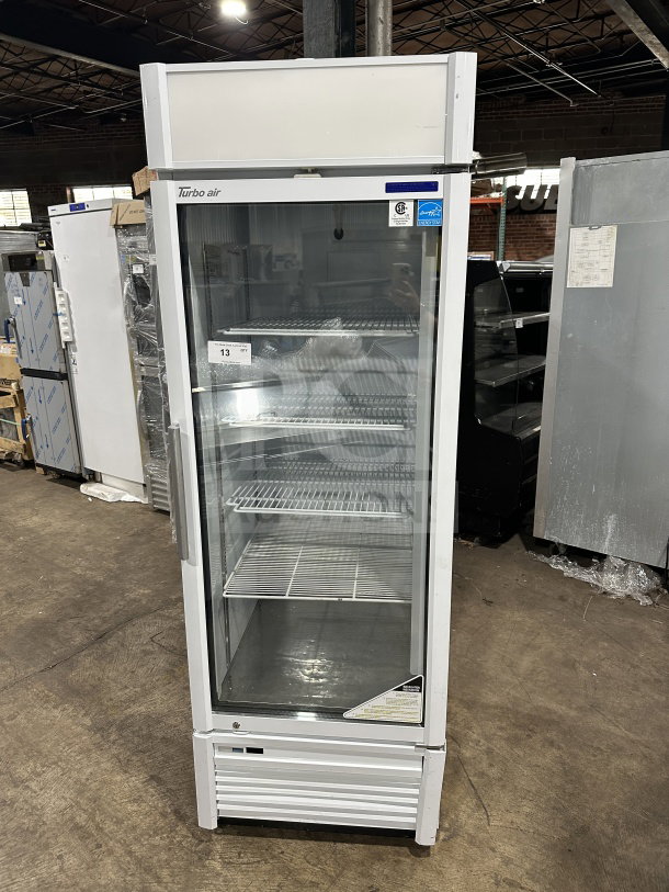 Turbo Air TGM-23SDW commercial fridge, new, single glass door, white, includes poly-coated wire rack, on casters.