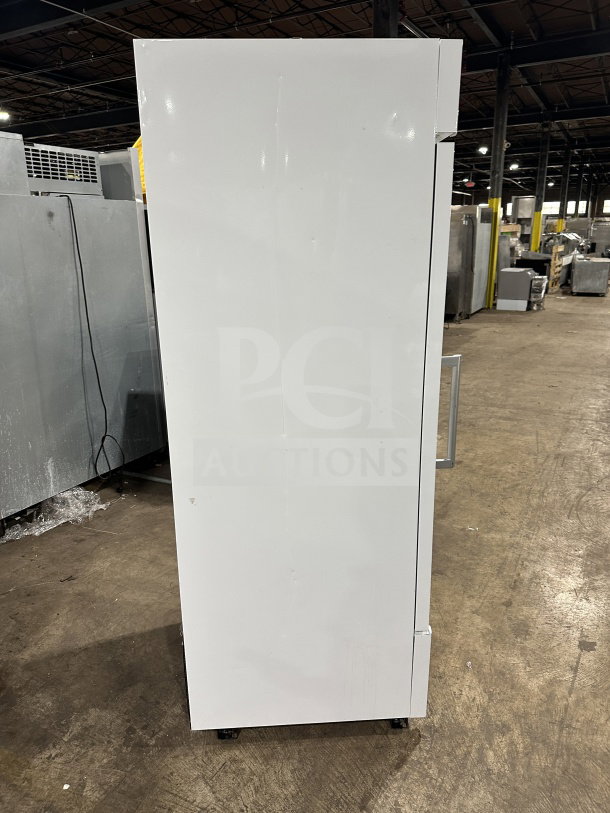 Turbo Air TGM-23SDW, single glass door fridge, new condition, electric, white, poly coated rack, on casters.