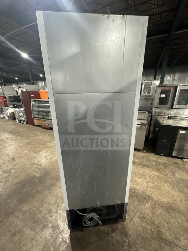 Turbo Air TGM-23SDW commercial fridge, single glass door, white, electric-powered, poly coated rack, new condition.