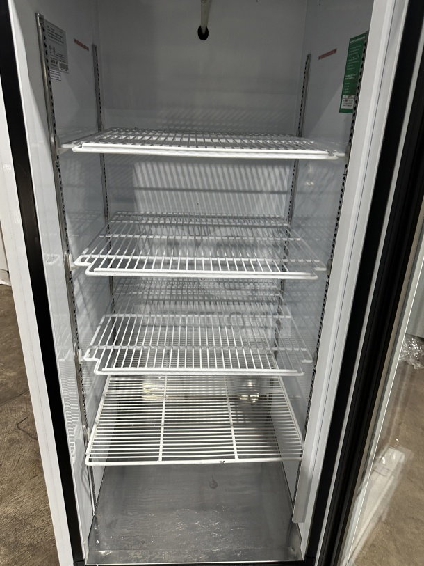 Turbo Air TGM-23SDW commercial fridge, brand new, single glass door, poly-coated wire racks, 110-120V, on casters.