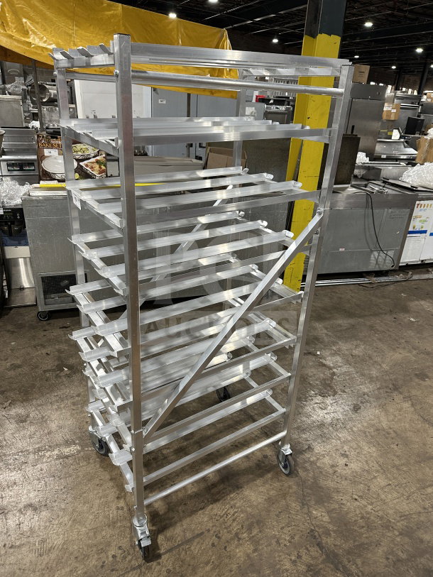 BRAND NEW Channel CSR-156M heavy-duty aluminum FIFO can rack, 156-can capacity, on casters, shown in a warehouse.
