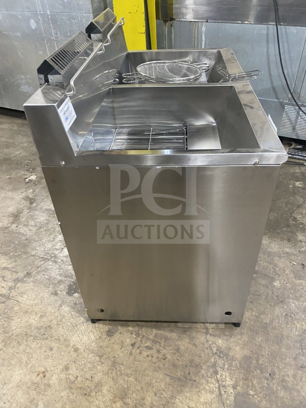 Gaoji Gorgeous stainless steel gas fryer, model MHGF2T46F, new condition, dual tank, free-standing on legs.