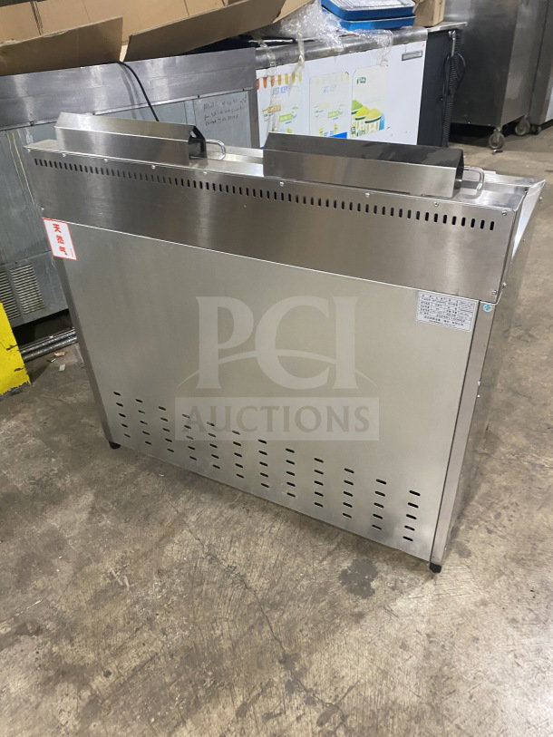 BRAND NEW Gaoji Gorgeous stainless steel double tank gas fryer, Model MHGF2T46F, with labels, on legs.
