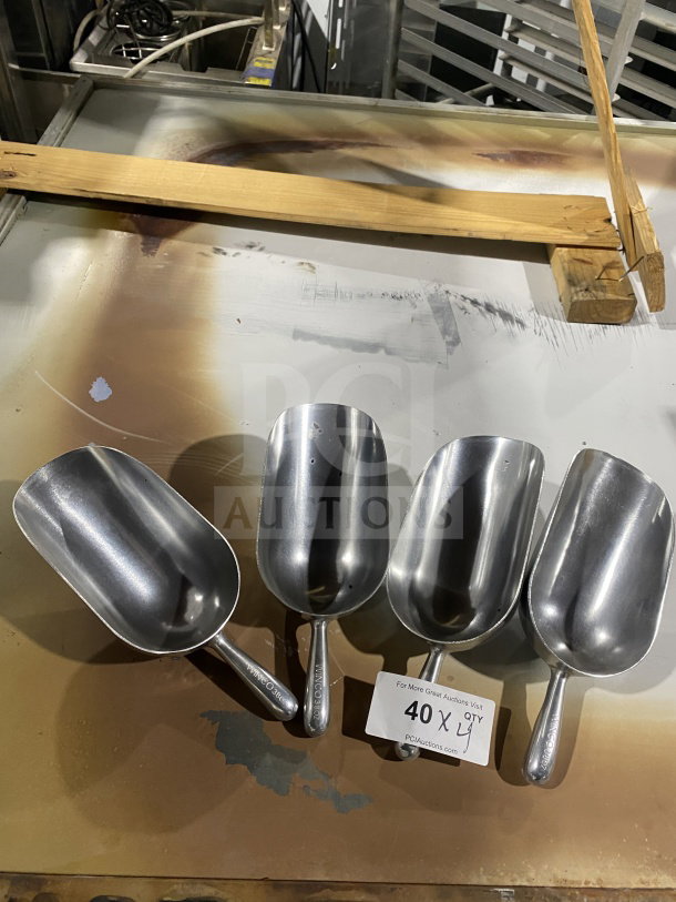 BRAND NEW! Set of four Winco 38 oz commercial heavy-duty aluminum utility scoops, with visible branding on handles.