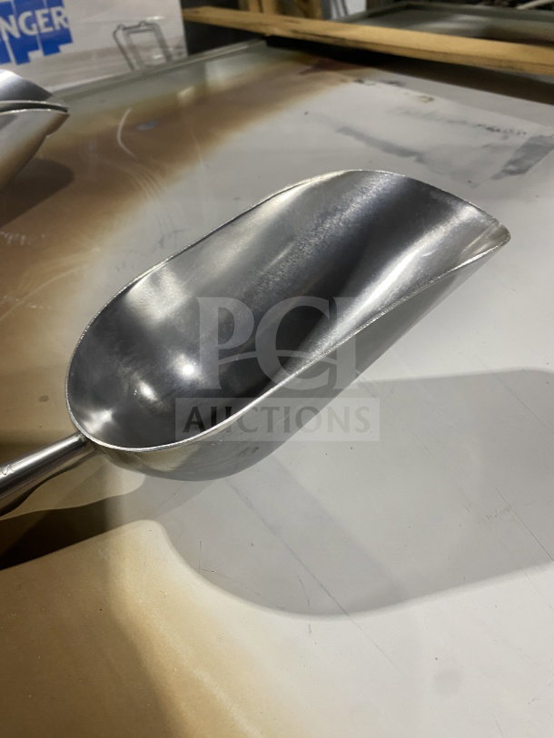 BRAND NEW Winco 38 oz heavy-duty aluminum utility scoop, ideal for commercial use, durable construction.