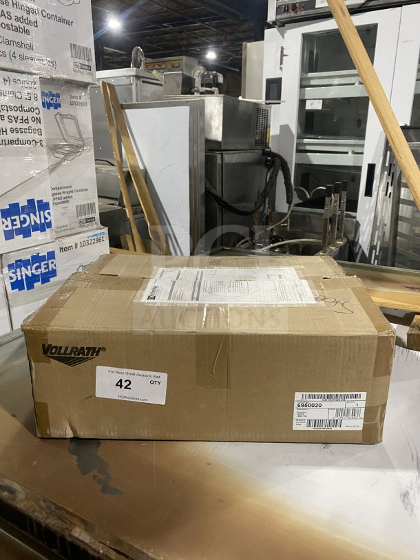 Vollrath Stainless Steel Hot Plate, Model 6950020, 1800W, new in box. Packaging shows labels with model and serial number.