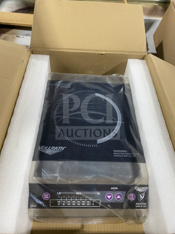 Brand new Vollrath stainless steel electric hot plate, 1800W, model 6950020, packaged in box, 120V power.