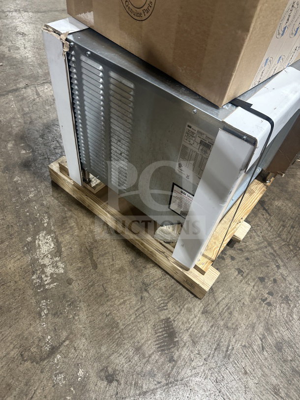 Brand new Taylor RD3012 frozen beverage dispenser, stainless steel, dual-flavor, 115V, 1 phase, on wooden pallet.