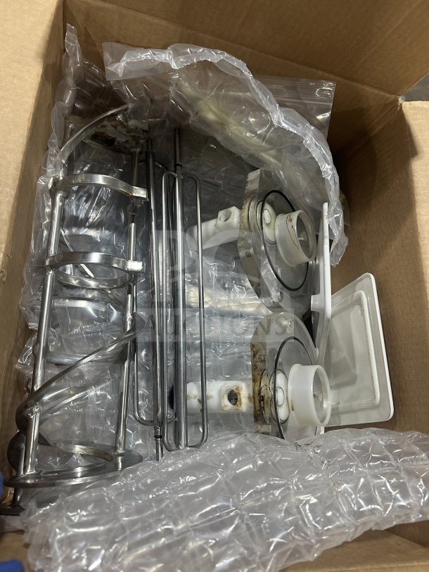 Brand new Taylor RD3012 stainless steel frozen beverage dispenser parts in a box, includes spirals and components; pristine condition.