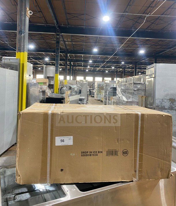 Brand new commercial stainless steel drop-in ice bin with sliding lid, in original packaging. Box labeled "DROP IN ICE BIN 600DIB1836," NSF certified.