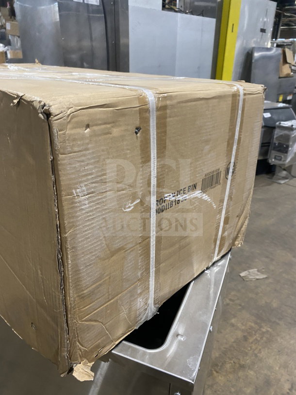 Brand new commercial stainless steel drop-in ice bin with sliding lid, in original packaging. Box slightly worn.