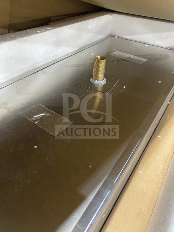 Brand new commercial stainless steel drop-in ice bin with sliding lid, featuring a brass drainage fitting, in pristine condition.