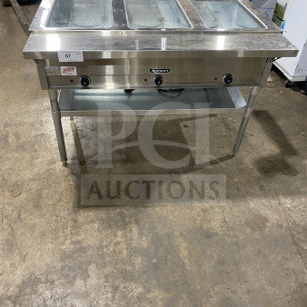 Adcraft stainless steel 3-pan steam table, model ST1203, new condition, with undershelf storage and electric power, 120V.
