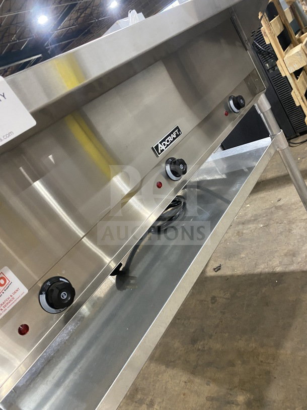 Stainless steel Adcraft 3-pan steam table, model ST-120/3, with undershelf, 120V, new condition.