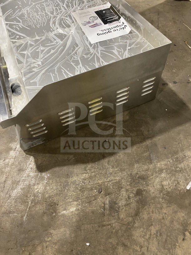Avantco 48" commercial stainless steel electric griddle, model 177EG48N, with back and side splash, brand new.