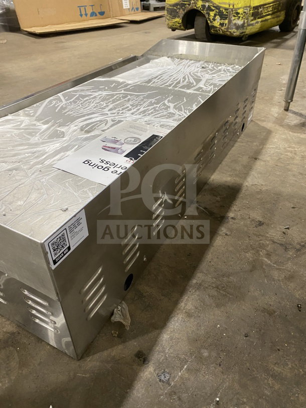 Avantco 48" electric countertop griddle, stainless steel, with back and side splash. Model 177EG48N, new condition.