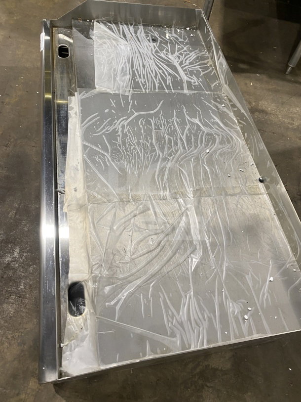 Avantco 48" stainless steel electric countertop griddle, model 177EG48N, new condition with back and side splash guards.