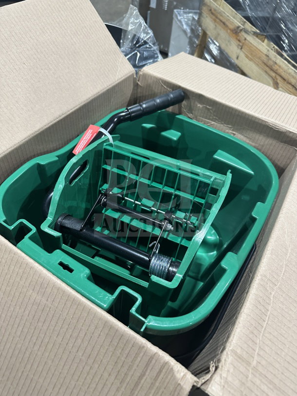 Sparta 35 Qt green mop bucket, model 8690409, with side press wringer, brand new, on casters, in open box.