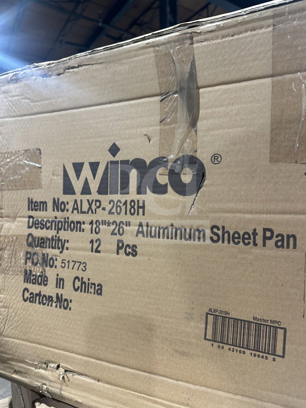 Box labeled Winco Aluminum Sheet Pan Model ALXP-2618H, size 18x26 inches, 12 pieces, serial 10342169106455.