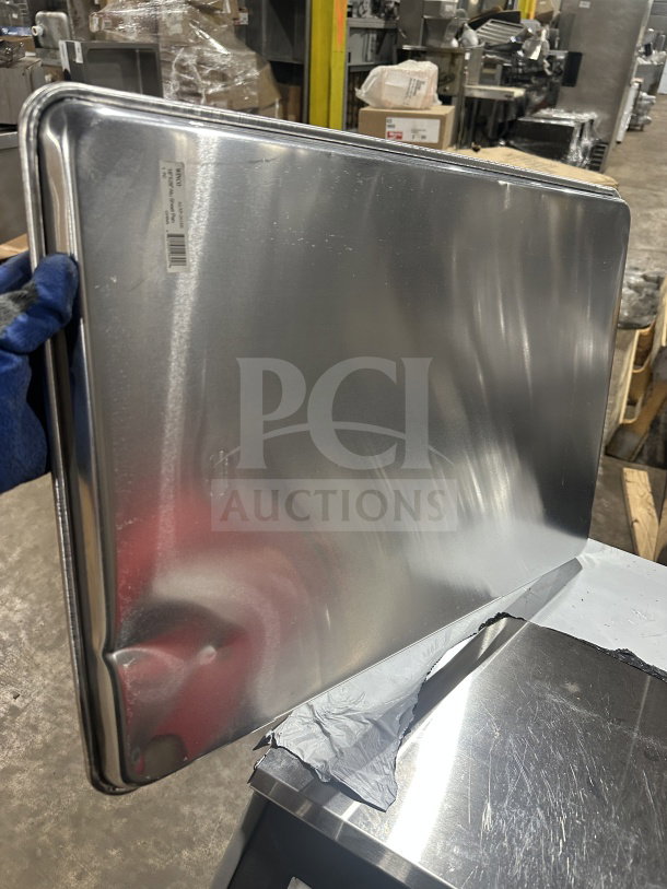 Brand new Winco 18"x26" full-size aluminum sheet pan, model ALXP-2618H with visible label, SN: 10342169106455.