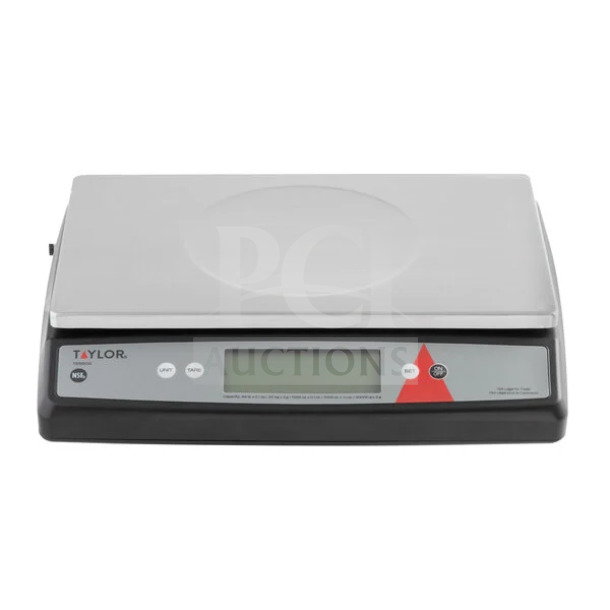 Brand new Taylor commercial stainless steel digital portion control scale with oversized platform and LCD display.