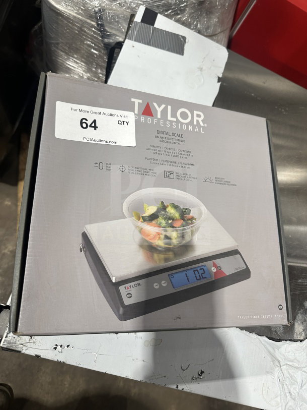 Brand new Taylor Commercial Stainless Steel Digital Portion Control Scale in box, features oversize platform and precise weight display.