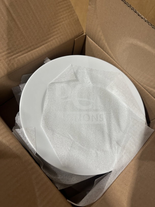 Turgla 11" round white porcelain dinner plate with rolled edge, model D128DU00, new in box.